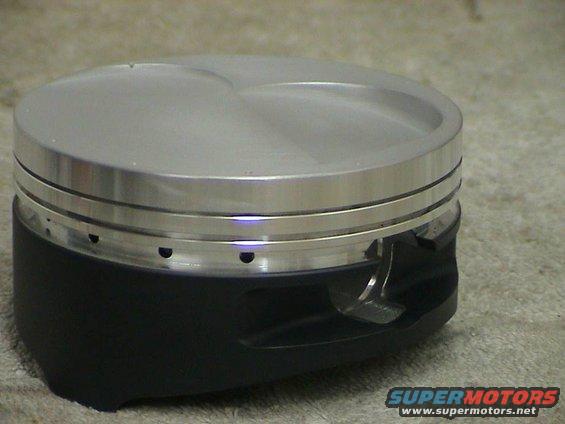 Piston with two compression rings and an oil ring groove