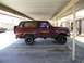 1989 Ford Bronco - This maroon Ford Bronco appears to be from the early 1980s, not a 1989 model as claimed.