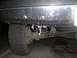 1989 Ford Bronco - Close-up view of tow hooks installed on a vehicle's frame.