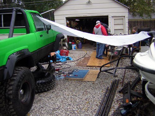 dscn0748.jpg trying to stay out of the rain

bought new seals..repacked bearings and hubs..replaced rotors/calipers/brake lines

brakes caught on fire..drivers side caliper leaking..passenger side caliper  had a sticky piston..etc..etc..not for sure on the exact causes, but seemed to be old lines..something cruddy in one line...and then a combination of age