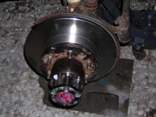 dscn0752.jpg new brake rotor/caliper/brakeline installed

found a chunk of solid something that shot out of the caliper while bleeding..may have been part of the brake issues