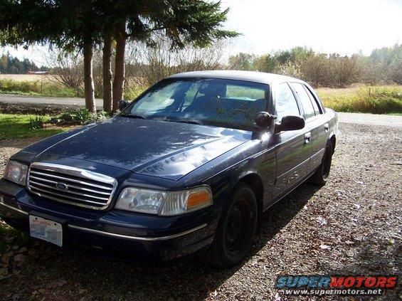 Dark blue 1998 Ford Crown Victoria parked outdoors