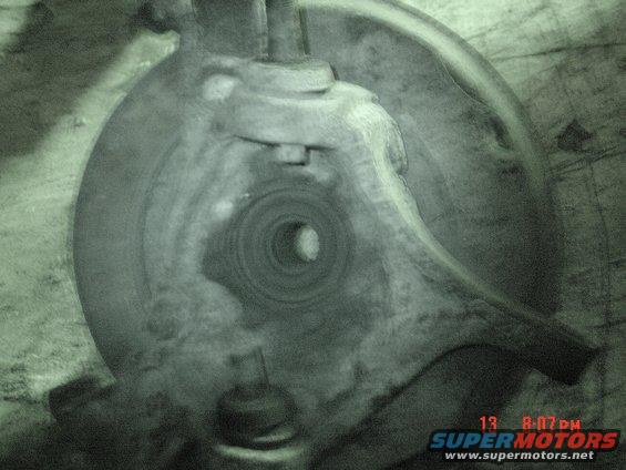 Close-up of a wheel hub assembly with visible bearing races