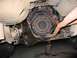 1989 Ford F-150 - Close-up of the vehicle's clutch assembly and drivetrain components, showing wear and tear.
