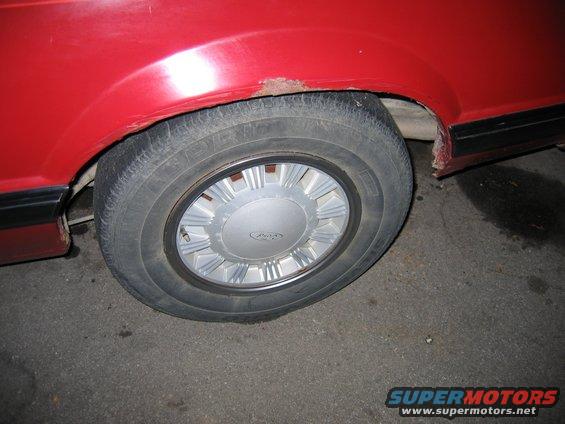   Gross wheels :( i'm going to buy some 10 hole rims for it tho and paint them black