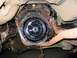 1989 Ford F-150 - The clutch assembly of a vehicle, showing a newly installed clutch disc and pressure plate within the bell housing.