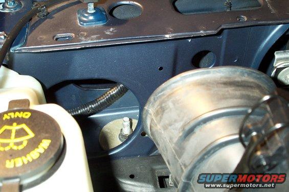 wire-routing-.jpg There is less room to run wiring on the driver's side. I ended up removing the Marauder Airbox so I could run the wire and it's wire loom in the corridor between the engine compartment and the front fascia. You can see the wire loom in this picture.