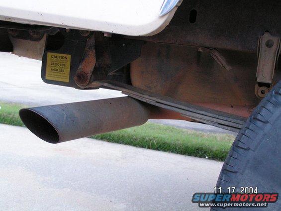 Leaf Spring sitting on exhaust after installing SKY shackle flip.