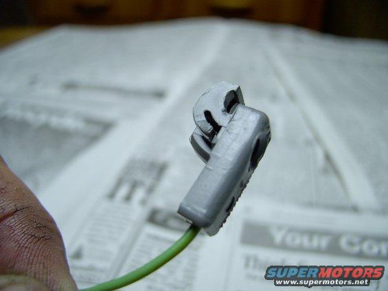 img_0065.jpg See that tiny little tab, where the curve comes close to the main body of the connector.  Tough angle to photograph, but all you have to do is depress that tiny little tang and the whole connection will push out, intact no less.