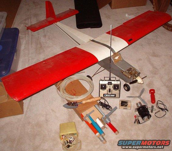 telemaster-1.jpg My good old RC airplane, complete & virtually ready-to-fly.  All the spare parts & accessories go with it.  I'm sure the radio's NiCd batteries are bad.  The radio is actually made by Futaba, and the engine is a Royal .40 .  The receiver is the upgraded style, but the working original is included.