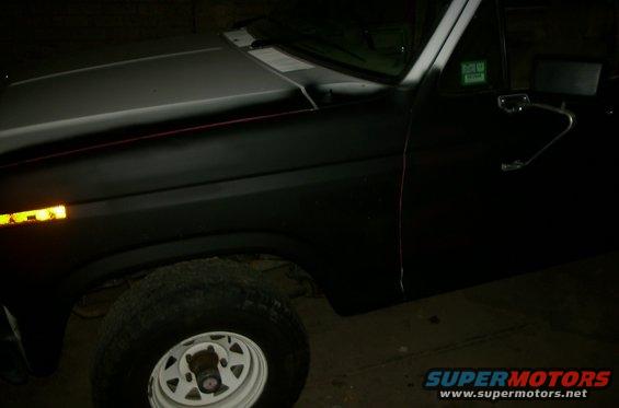 Ford Bronco front fender and door, matte black paint, white rim wheel