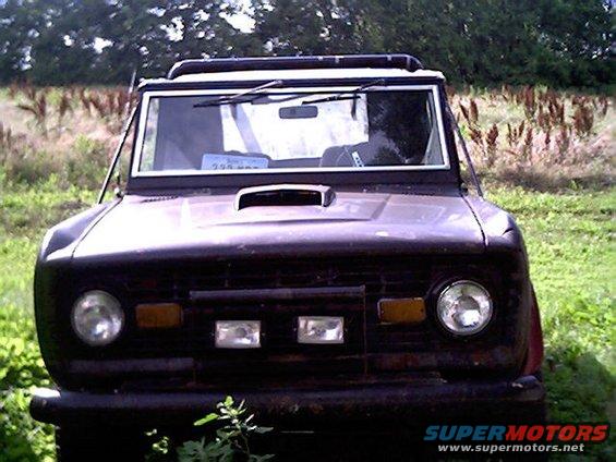 1976 Ford Bronco with a Half Cab Soft Top.