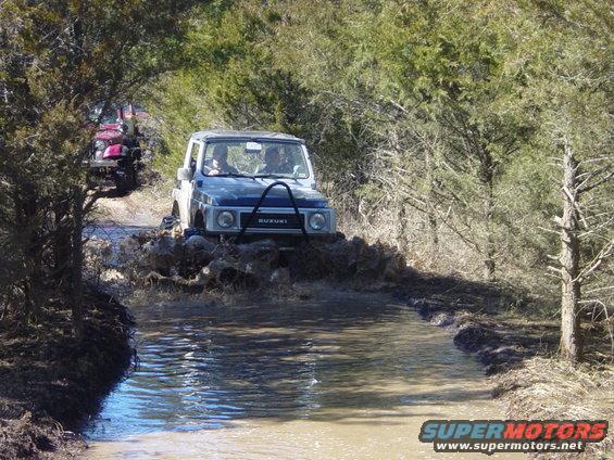 Chris' Samuri playing in the Missouri mud