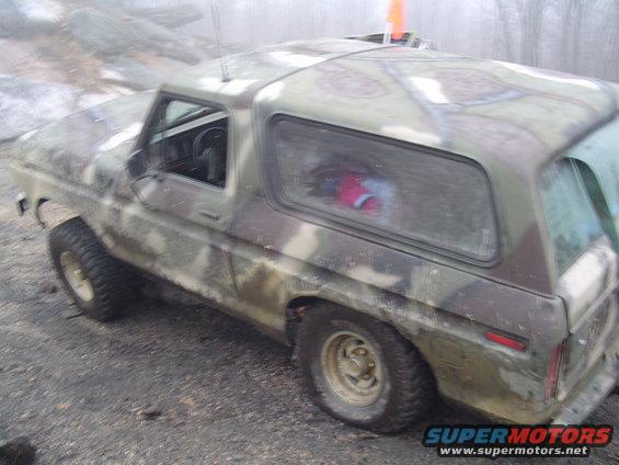 Camouflaged SUV, 3q-front view