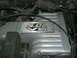 1996 Ford Explorer - Close-up of an engine intake manifold showing a "5.0L V8" emblem.