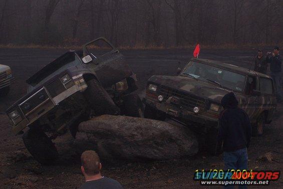 1979 Ford Bronco navigating rocks, front grille visible