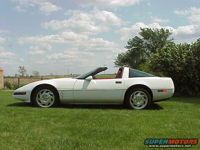 White 1994 Chevrolet Corvette convertible, side view