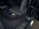 2003 Ford Ranger - Interior view of a vehicle's passenger side, highlighting aftermarket audio components and a seat.