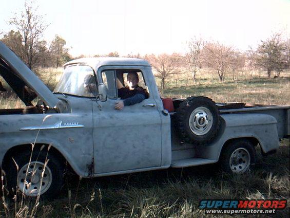 mudidngturcketc...-064.jpg Hers a pic of a 58 chevy that is out my friends gpa's where the trail is. This thing turned right over after years of sitting when we put  a little gas in the carb and a battery in. Its fun to drive with 3 on the tree.