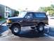 1989 Ford Bronco - Black 1989 Ford Bronco with lifted suspension and off-road tires.