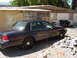 1999 Ford Crown Victoria - September 21, 2004 Passenger side far side view in the driveway.