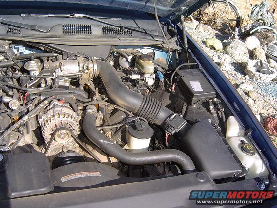 September 26, 2004
Engine compartment as I acquired it. Note the stock air box and throttle body.