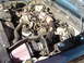 1999 Ford Crown Victoria - September 26, 2004 Side view of complete K&N Cold Fuel Injection Performance Kit and Poweraid throttle body spacer installed.