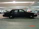 1999 Ford Crown Victoria - November 26, 2004 Passenger side low from a far.