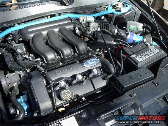 Ford Duratec 2.4L V6 engine with blue strut bar and battery
