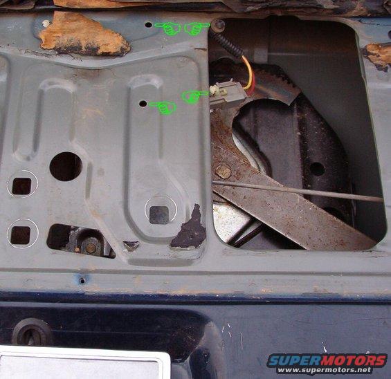 center-gone.jpg To access the motor connector, push out these 2 retainers and pull the connector where you can see it.  If  you're only changing the motor drive gear, this isn't necessary.