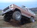1978 Ford Bronco - This 1978 Ford Bronco is shown navigating a steep dirt incline during an off-road excursion.