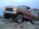 1978 Ford Bronco - This 1978 Ford Bronco navigates a rocky incline, its off-road capabilities.