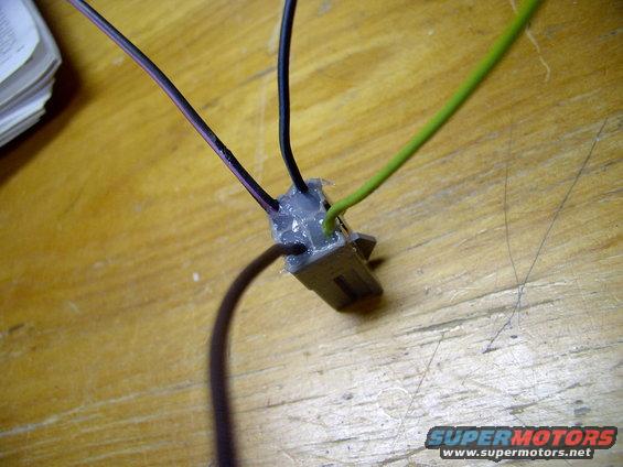 img_0239.jpg Let it cure for a few hours and it's nearly waterproof, from the back at least. Wherever air(and water) can't get to, corrosion can't start up again.