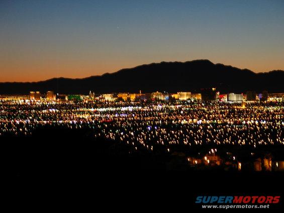Las Vegas strip skyline at dusk with mountains in background