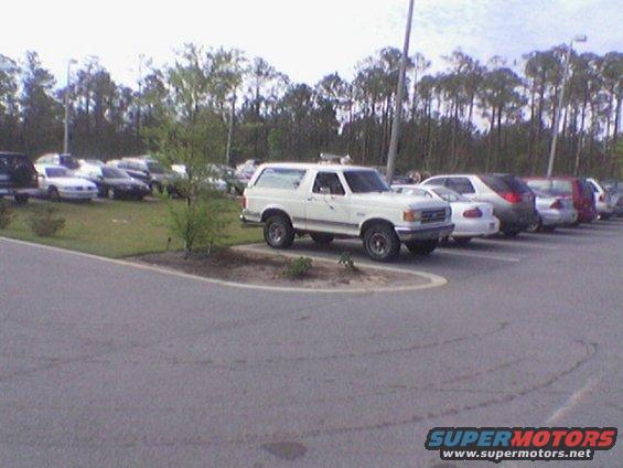 White 1990 Ford Bronco parked in a lot
