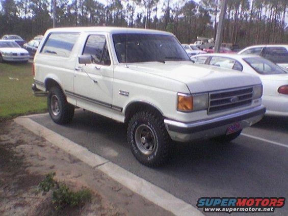 White 1990 Ford Bronco parked in a lot