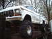 1979 Ford F-150 - This heavily modified 1979 Ford F-150 pickup truck is loaded onto a trailer.