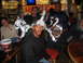 2002 Ford Taurus - Friends gather at a bar, sporting creative tinfoil headwear while one person wears a Baltimore Ravens jersey.
