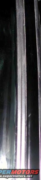 Chrome trim detail on a dark vehicle