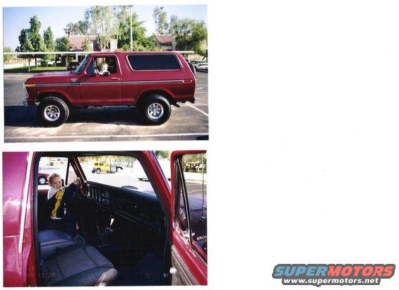 Red 1978 Ford Bronco side view with a child in the driver's seat