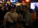 2002 Ford Taurus - A group of friends enjoy a night out at a lively bar.