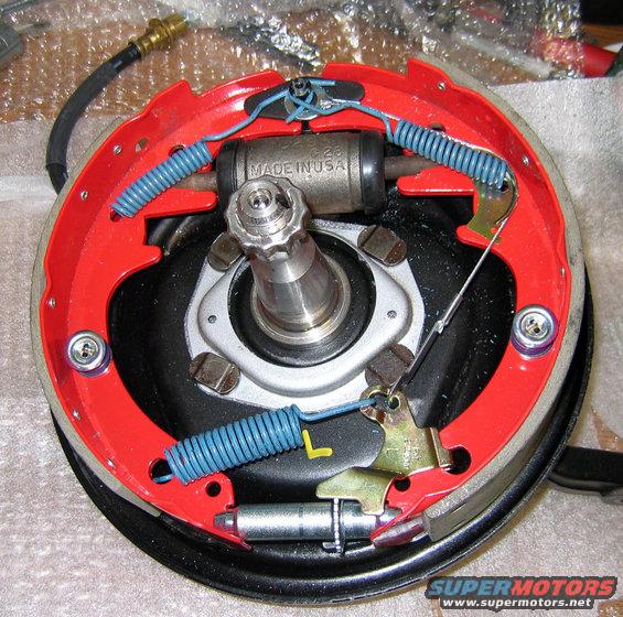 brake.jpg Wow, it seems a shame to put a drum on this work of art. This non-power, front drum, braking system should have about the same 60-0mph stopping distance as a fully loaded coal train. 