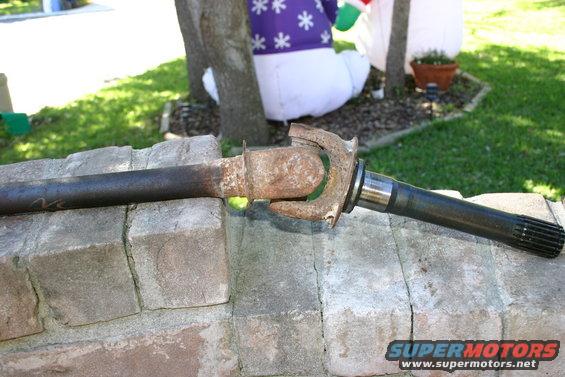 Driveshaft with U-joint, rusty