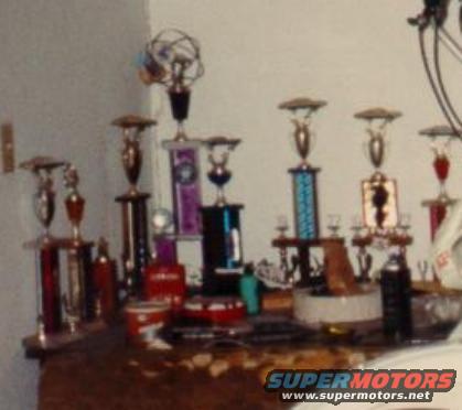 a_couple_trophies_200_or_more_in_garage.jpg a few of my "trophies" from racing bikes and cars.