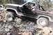 1984 Ford Bronco - This Ford Bronco is navigating a challenging off-road trail.