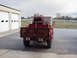 1973 Ford F-250 - This fire truck is equipped with a hose reel and a fire extinguisher.