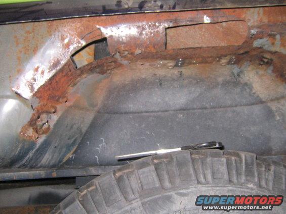 photos-031.jpg fixing the holes in to the truck 