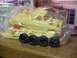 1979 Ford Bronco - A model kit of a pickup truck is shown in its packaging with loose tires.