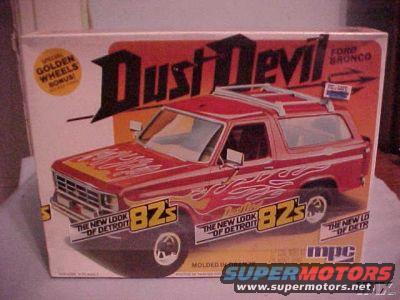 Red 1979 Ford Bronco model kit box art with flames and "Dust Devil" graphics