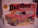 1979 Ford Bronco - Box art for a 1979 Ford Bronco model kit, a red body with flame decals and "Dust Devil" branding.